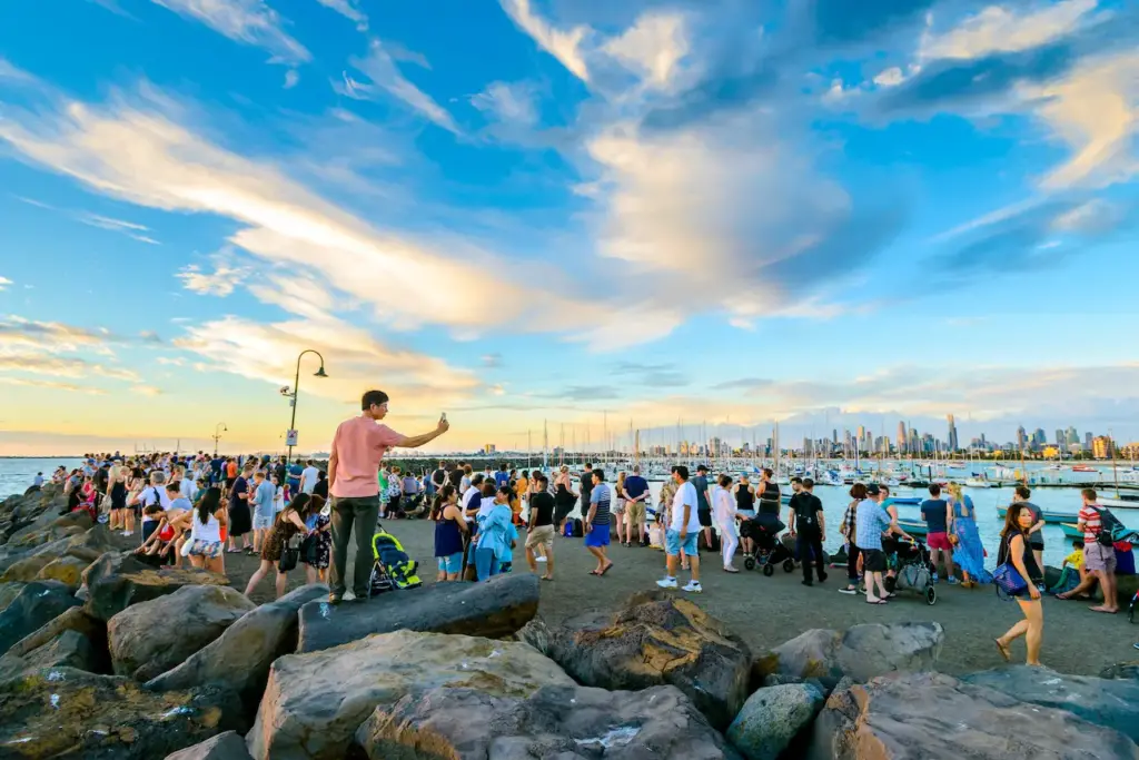 Crowd of People Gathered at St Kilda Breakwater 